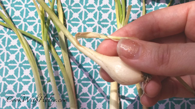 Extend the life of green garlic and scallions by removing wilted outer leaves.